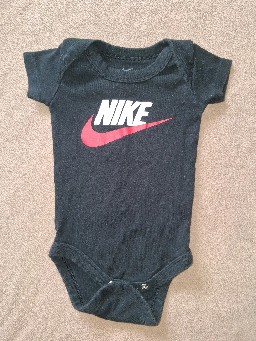 Nike Black Baby Bodysuit with Red Swoosh